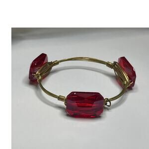 BOURBON & BOWETIES gold tone bracelet bangle red faceted signed jewelry wire